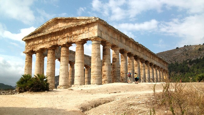 The columned ruins of the Doric temple of Segesta in Sicily, Italy The columned ruins of the Doric temple of Segesta in Sicily, Italy