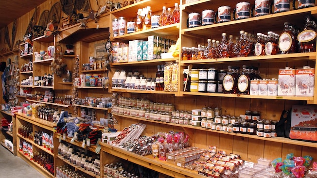 A wall display featuring various maple-based products and souvenirs A wall display featuring various maple-based products and souvenirs