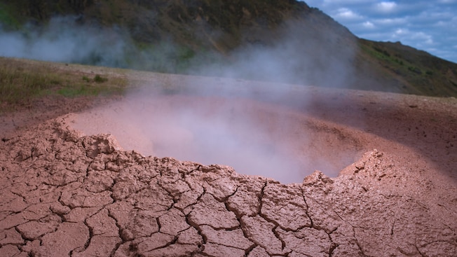 Smoke rising from a volcanic crater Smoke rising from a volcanic crater