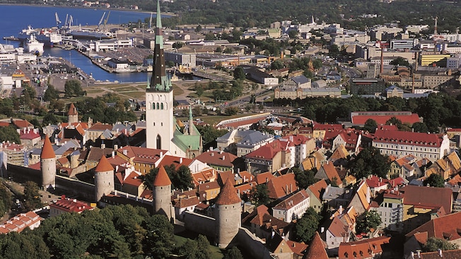 A medieval wall with towers surrounds Old Town Tallin A medieval wall with towers surrounds Old Town Tallin