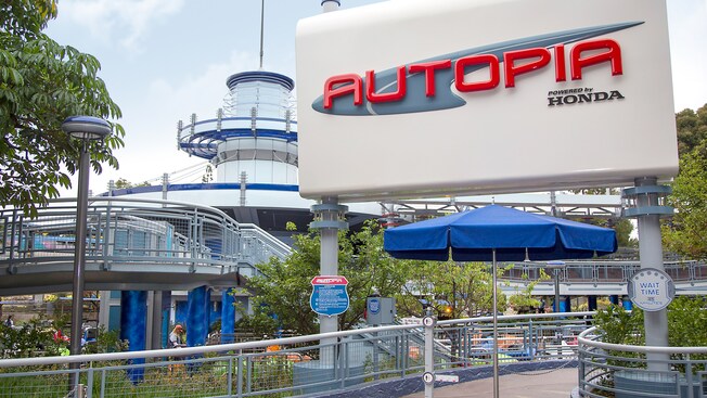 The new, Honda sponsored Autopia sign stands over the entrance of this iconic attraction