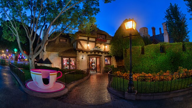 A whimsical tea cup leading the way to the entrance of Mad Hatter in Fantasyland at Disneyland Park