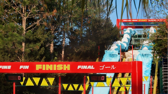 The Finish sign and the waterslides beyond at Downhill Double Dipper