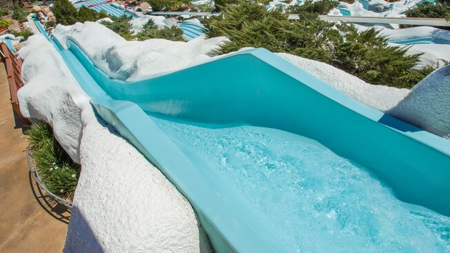 Slush Gusher waterslide at Disney's Blizzard Beach, flanked by snow