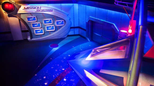 A wall inside Advanced Training Lab with 6 screens below a sign that reads, 