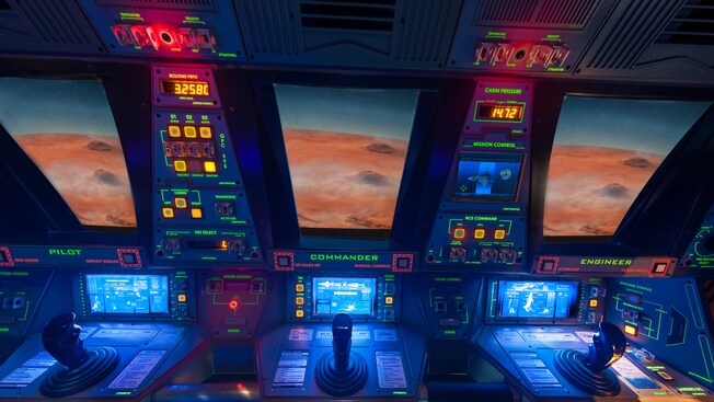 A simulator cockpit with seats for a pilot, commander and engineer at Mission: SPACE