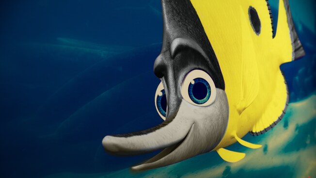 A cartoon-like fish with a long snout and big blue eyes at The Seas with Nemo & Friends Pavilion