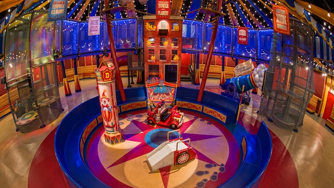 The interactive wait area inside a circus tent at Dumbo the Flying Elephant