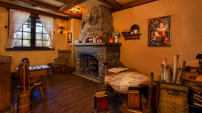 Inside Maurice's cozy cottage at Enchanted Tales with Belle in Fantasyland