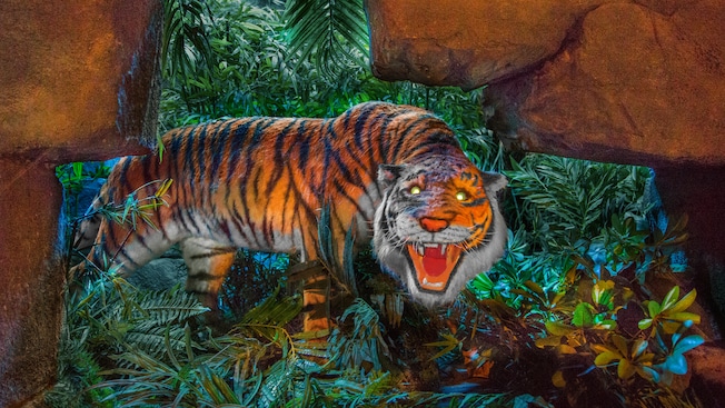A fierce tiger bares its teeth in the dark jungle
