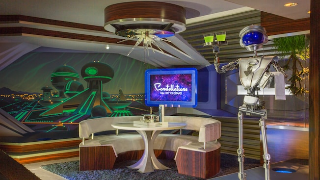 A robot waiter in the space bar in the city of Constellations at Space Mountain