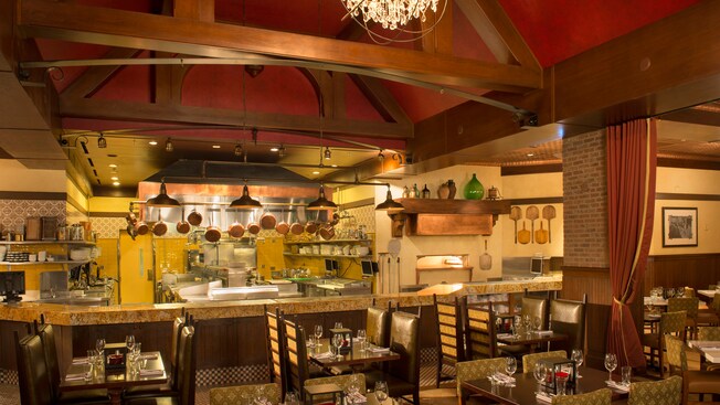 The open kitchen at Trattoria al Forno, with hanging copper pots and an insider view of ‘al forno’ baking.
