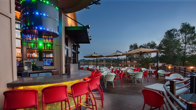 Outdoor deck at Paradiso 37, Taste of the America, with a bar and tables overlooking the water