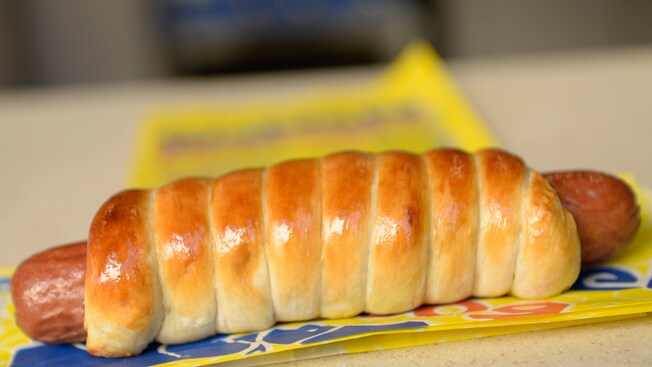 A hot dog wrapped in a spiral pretzel