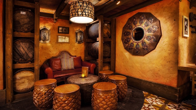 Lounge area with sofa, drum-shaped seats and table