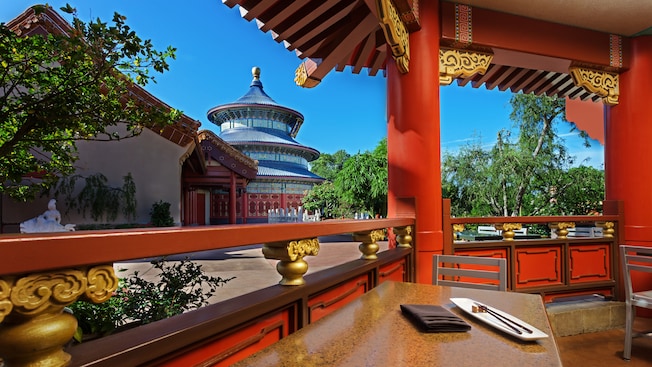 Open-air dining area at Lotus Blossom Café with view of the 3-tiered Temple of Heaven