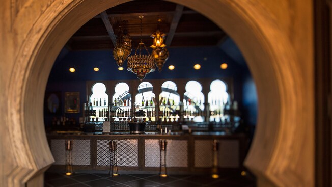 A Moroccan themed bar with an ornate chandelier