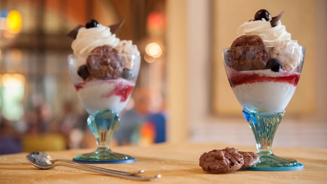 Two cherry and vanilla gelato sundaes