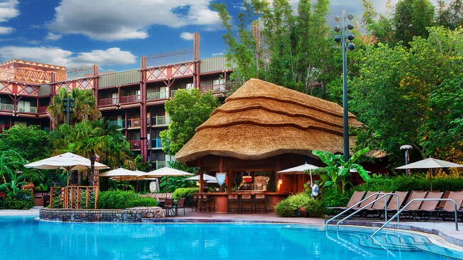 A thatched-roof bar next to the Uzima Springs Pool