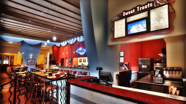 Ordering counter at the 'Sweet Treats' section, with table, dining and counter areas in background
