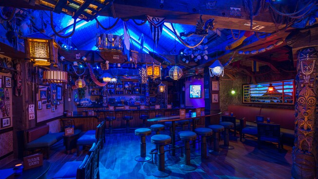 Night view of Trader Sam’s Grog Grotto, a tiki bar packed with exotic, whimsical Pacific island artifacts