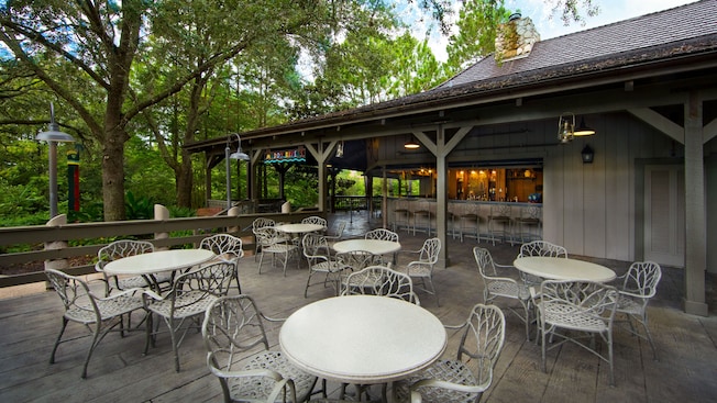 Wrought iron tables and chairs in patio area at Muddy Rivers