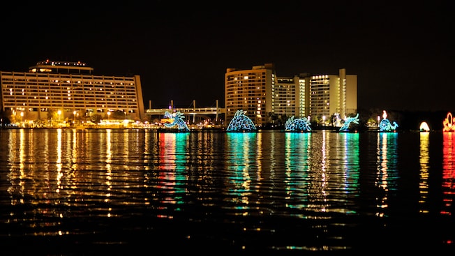 A sea serpent float leading the Electrical Water Pageant in Bay Lake