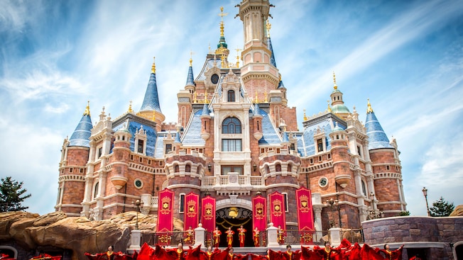 A rousing daytime performance in front of Enchanted Storybook Castle at Shanghai Disneyland in China