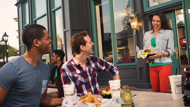 Friends enjoy their meals at an outdoor table at Cookes of Dublin
