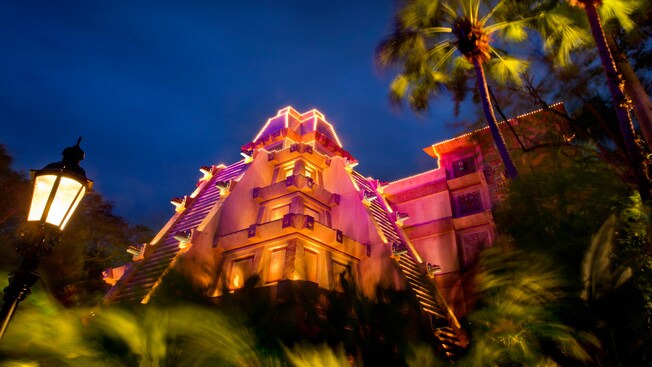 The Aztec Temple in the Mexico Pavilion bathed in magenta lights at night