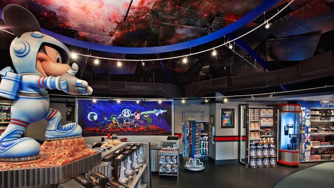 Astronaut Mickey statue and merchandise at Mission Space Cargo Bay at Epcot