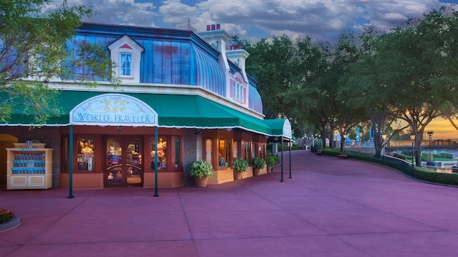 Exterior of the World Traveler shop at Epcot World Showcase at dusk