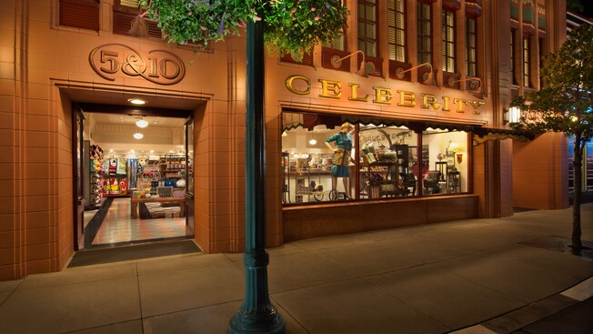 Storefront of Celebrity 5 & 10 at Disney's Hollywood Studios, lit up at night