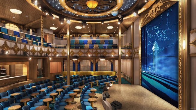 Uma elegante sala de projeção com assentos em 2 níveis, um palco, uma tela de 2 andares e um bar completo