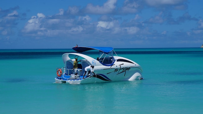 A glass bottom boat in the waters off Grand Cayman A glass bottom boat in the waters off Grand Cayman