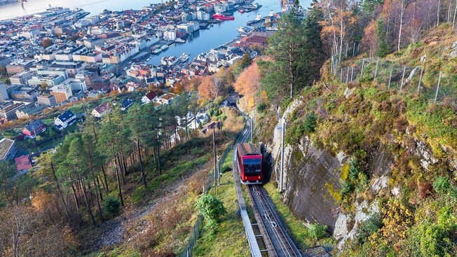 The Fløibanen funicular ascending a section of Mount Fløyen with panoramic views of Bergen, Norway