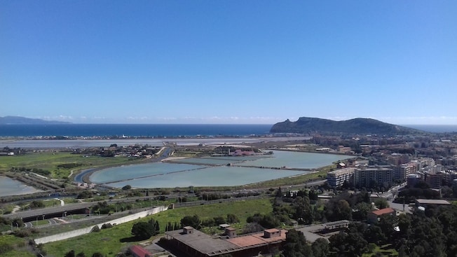 A panoramic view of Cagliari, the capital of Sardinia, Italy, taken from the Monte Urpinu viewpoint A panoramic view of Cagliari, the capital of Sardinia, Italy, taken from the Monte Urpinu viewpoint