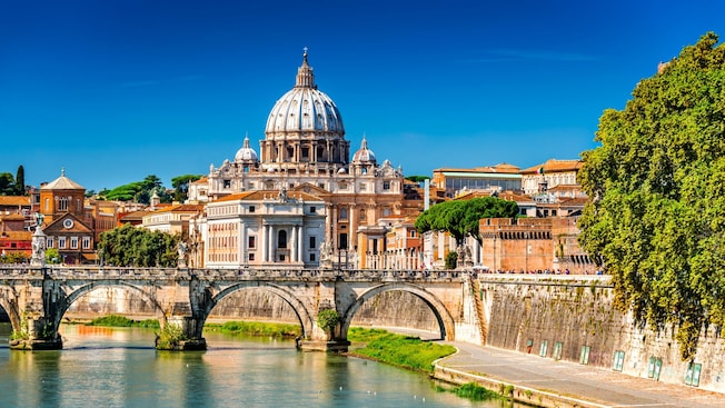 A bridge over the Tiber River in front of Saint Peter’s Basilica A bridge over the Tiber River in front of Saint Peter’s Basilica