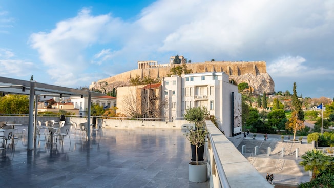 Rooftop seating at the Acropolis Museum in Athens, Greece, with views to the Parthenon Rooftop seating at the Acropolis Museum in Athens, Greece, with views to the Parthenon