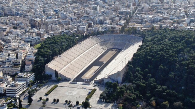 The Panathenaic Stadium surrounded by building in Athens, Greece