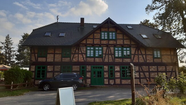 A Bavarian style farmhouse with brick and decorative timber framing