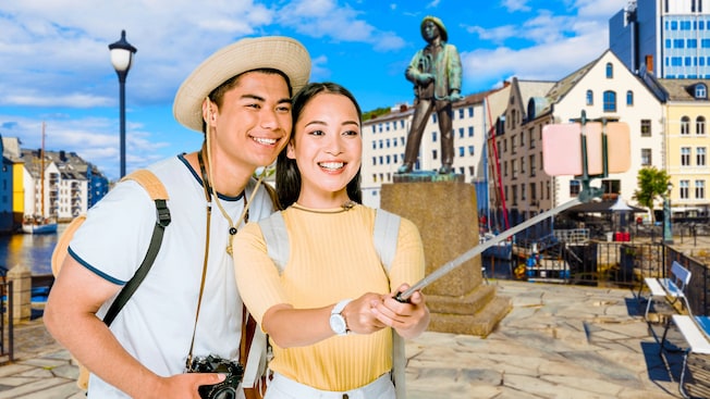 Two tourists holding cameras and a selfie stick on a cobblestone road Two tourists holding cameras and a selfie stick on a cobblestone road