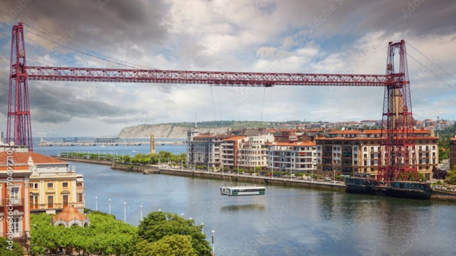 A gondola crossing the Vizcaya Bridge in Getxo, Spain A gondola crossing the Vizcaya Bridge in Getxo, Spain