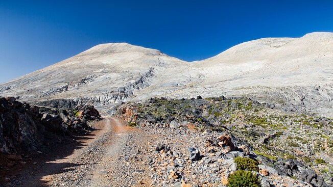 A trail leading up a barren mountainside