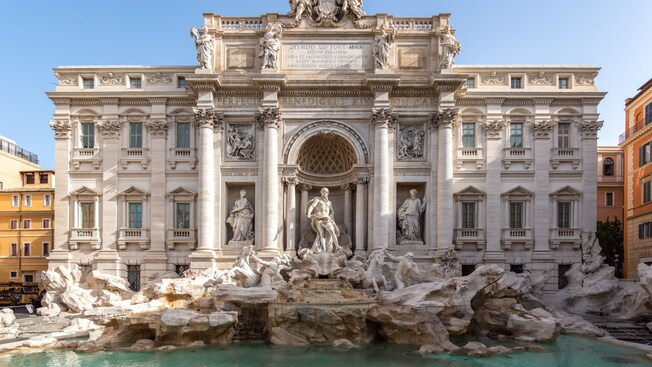 The Trevi Fountain, featuring a pool and marble statues, in Rome