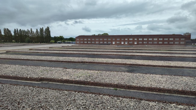 Exterior of Neuengamme Concentration Camp Memorial with paths that mark the location of former prisoner barracks and other structures Exterior of Neuengamme Concentration Camp Memorial with paths that mark the location of former prisoner barracks and other structures