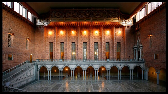 Blue Hall in Stockholm City Hall featuring a ramp that connects the first and second floor