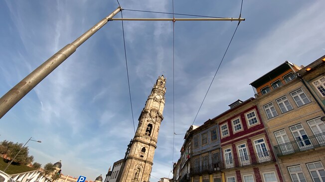 A street in Porto, Portugal featuring the Clérigos church bell tower