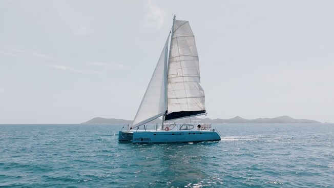 A charter boat floating in the Caribbean Sea