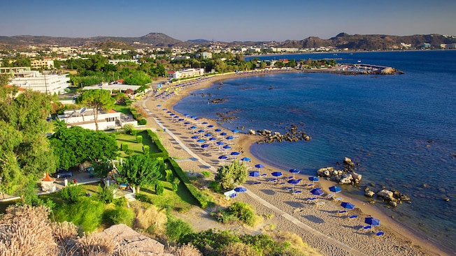 An aerial view of loungers and umbrellas on a beach at Faliraki in Rhodes An aerial view of loungers and umbrellas on a beach at Faliraki in Rhodes